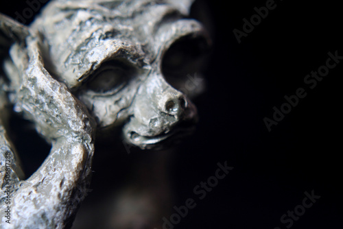 Gargoyle Statue, close up on Black Background