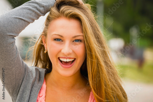 Happy teenage girl laughing