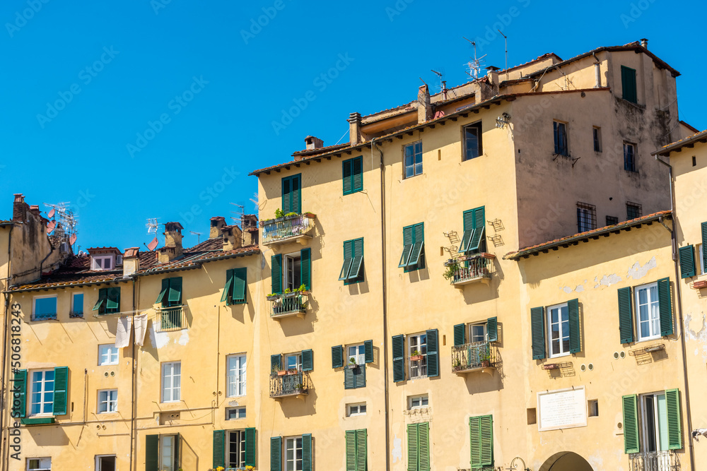 Lucca, Italy,18 April 2022: View of .Amphitheater Square, built over ancient roman ruins Lucca, Italy,18 April 2022: View of .Amphitheater Square, built over ancient roman ruins