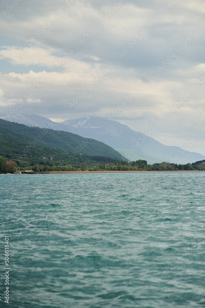 View of the beautiful lake Ohrid in the city of Ohrid. North Macedonia. High quality photo