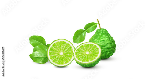Bergamot fruit is cut in half and leaves split on a cut path white background.