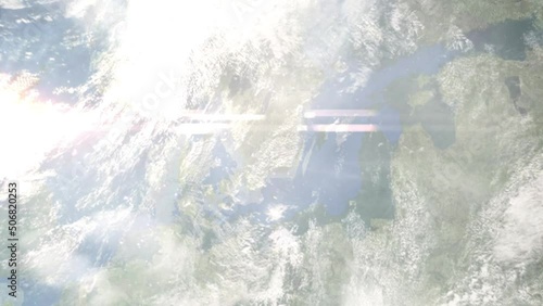 Earth zoom in from outer space to city. Zooming on Vaxjo, Sweden. The animation continues by zoom out through clouds and atmosphere into space. Images from NASA photo