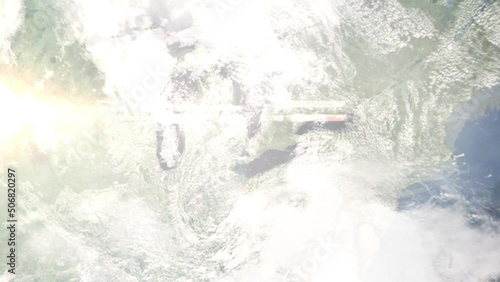 Earth zoom in from outer space to city. Zooming on Sarnia, Ontario, Canada. The animation continues by zoom out through clouds and atmosphere into space. Images from NASA photo