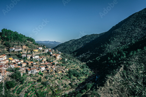 Vista de los montes en Las Hurdes (Cáceres, España) con un pueblo photo
