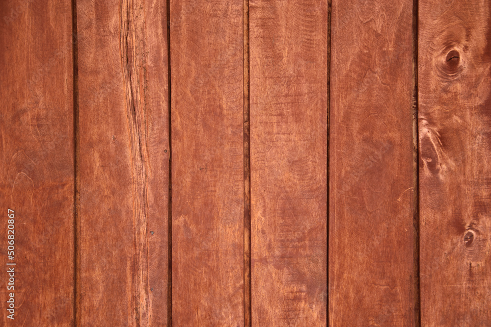 Obraz premium Pionowe drewniane brązowe deski 