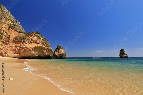 Cliffs and sea stacks-northern section Praia do Camilo Beach. Lagos-Portugal-255