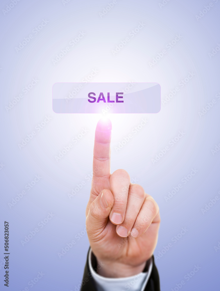 Businessman is Pushing On Sale Button Against Blue Businessman is Pushing On Sale Button Against Blue