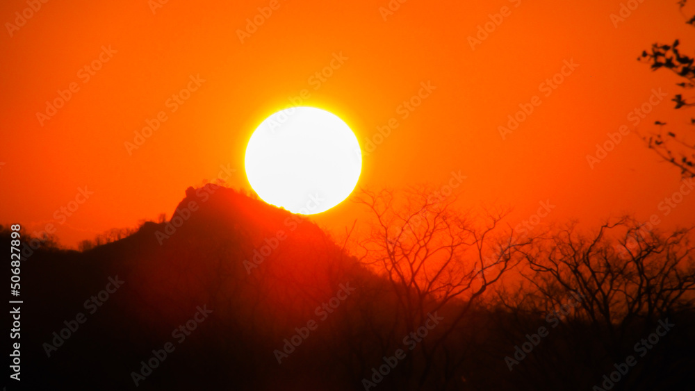 Sunset a beautiful sky orange golden clouds creating a beautiful and misteiroso scenery in the nordete of Brazil on the serrated biome