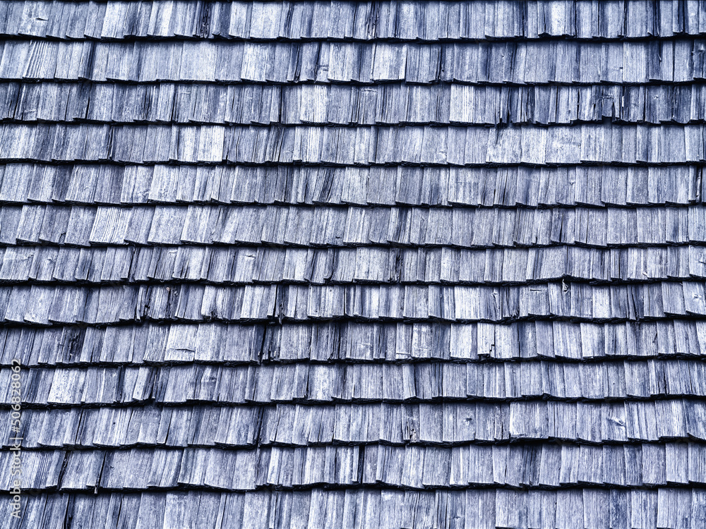 Wooden shingle (gont) background. Fragment of architecture of Kievan Rus 12th century. (Halychyna, Lviv region, Ukraine). Horizontal image.