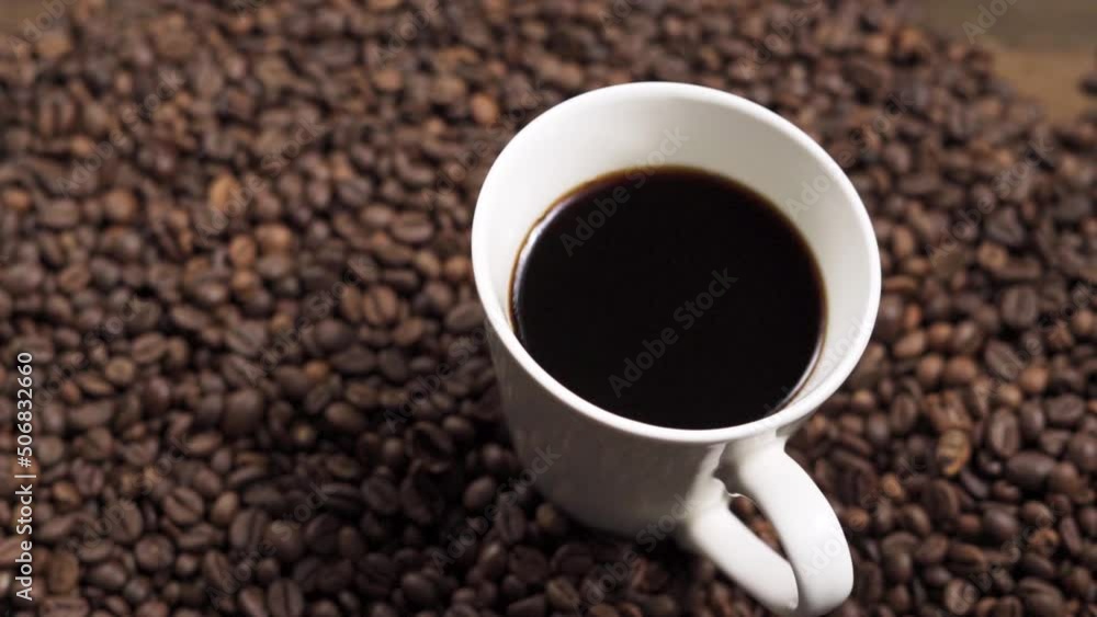 Dark roast coffee beans background, top view Dark roast coffee beans background, top view