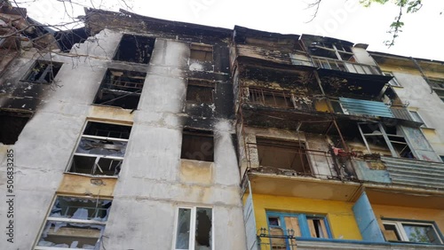 destroyed and burnt house in Mariupol