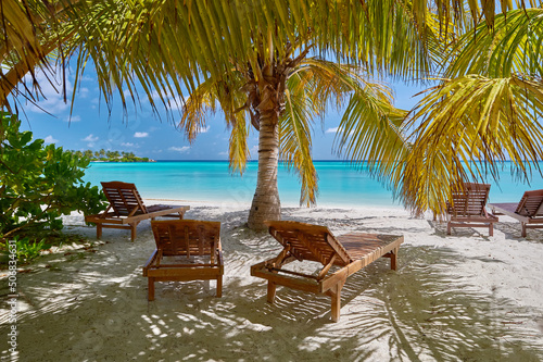 Tropical beach in Maldives. Travel and tourism to luxury resorts in the Maldives islands. Summer holiday concept © Alvov