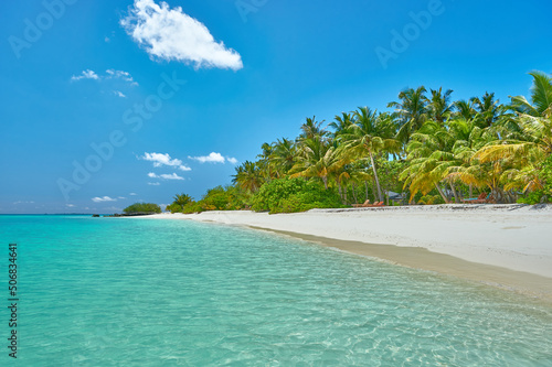 Maldives. Tropical beach. Travel and tourism to luxury resorts in the Maldives islands. Summer holiday concept