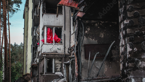 Obraz na płótnie Irpin, Kyiv Oblast, Ukraine - 19.05.2022: Cities of Ukraine after the Russian occupation. burnt and destroyed civilian building in city of Irpin, northwest of Kyiv. close up w salonie