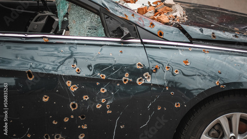 Irpin, Kyiv Oblast,  Ukraine - 19.05.2022: Cities of Ukraine after the Russian occupation. destroyed civilian car in  city of Irpin, northwest of Kyiv
