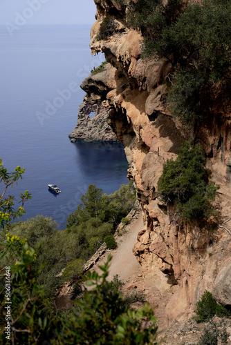 Sa Foradada, rocky peninsula in the Tramonta. At its tip it has a hole visible from a great distance. Deia, Majorca Spain