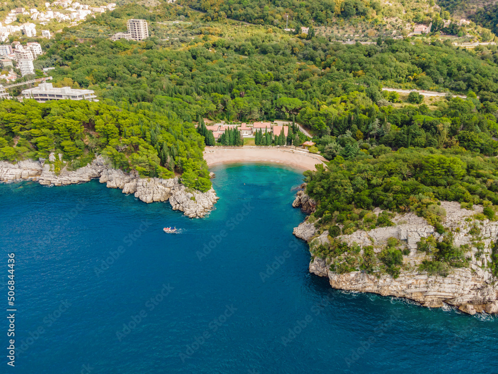 Obraz premium Queen's Beach in Milocer, Montenegro. Aerial view of sea waves and fantastic Rocky coast, Montenegro