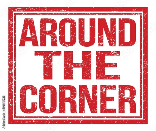 AROUND THE CORNER  text on red grungy stamp sign