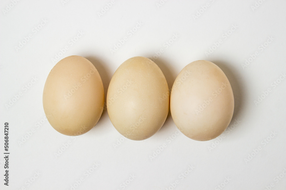 White duck eggs on a white background. Useful and delicious food. White duck eggs on a white background. Useful and delicious food.