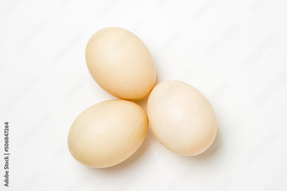White duck eggs on a white background. Useful and delicious food. White duck eggs on a white background. Useful and delicious food.