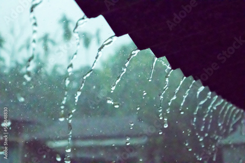 Rain water falling by the GI sheet