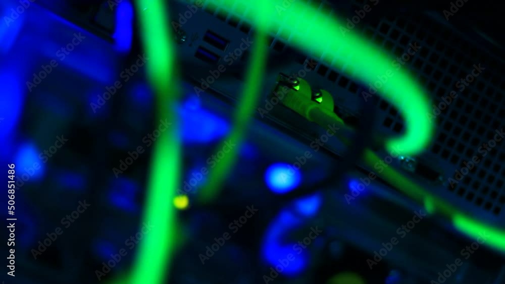 Cables UTP, RJ45 plug jack and LED blinking lights on Switches