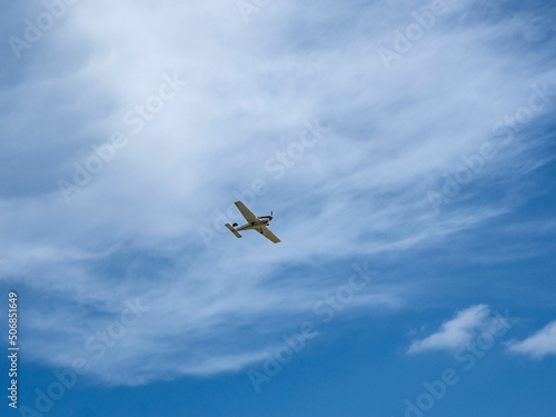 Small plane in the sky on a sunny day..copy space