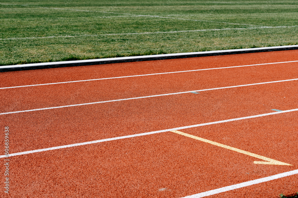 Fototapeta premium sports track around the sports field