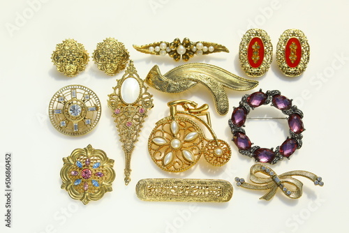 Fotografie, Obraz Vintage brooch lot collection costume jewelry fashion accessory