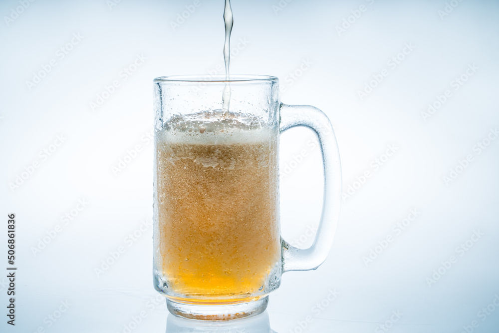 beer bubbles on a clear glass white background in the studio beer bubbles on a clear glass white background in the studio