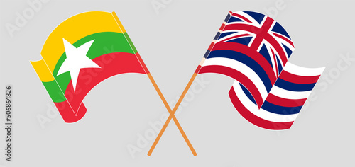 Crossed and waving flags of Myanmar and The State Of Hawaii