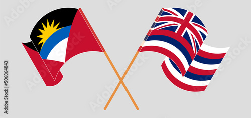 Crossed and waving flags of Antigua and Barbuda and The State Of Hawaii