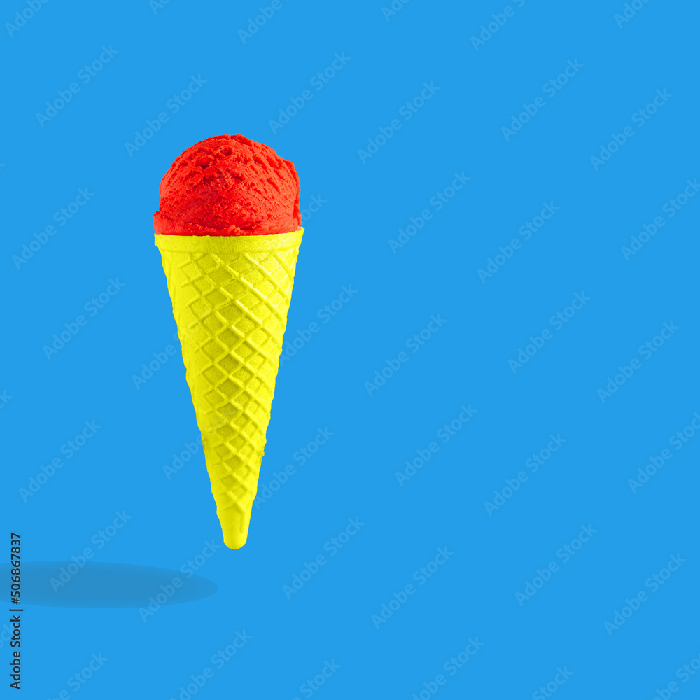 Flying or levitate pastel ice cream in a cone, red on a blue background. The concept of summer Flying or levitate pastel ice cream in a cone, red on a blue background. The concept of summer