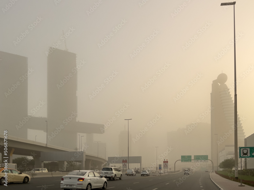 Naklejka premium Poor visibility during a sandstorm in the city