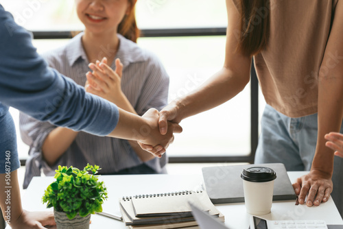 Photography Business people shaking hands, finishing up a meeting, business woman asian team partners in the office