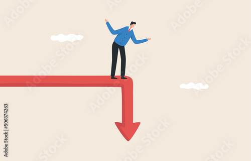 Financial crisis, unexpected stock market drop, money loss, capital devaluation, risky investment strategy. Businessman standing on a graph that plummets. © yellow_man