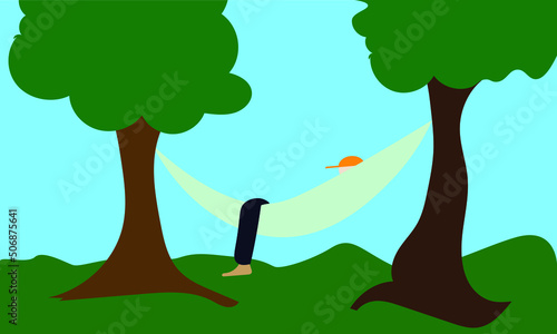A person lying inside a hammock that is hanging between two trees, concept of relaxing and summer