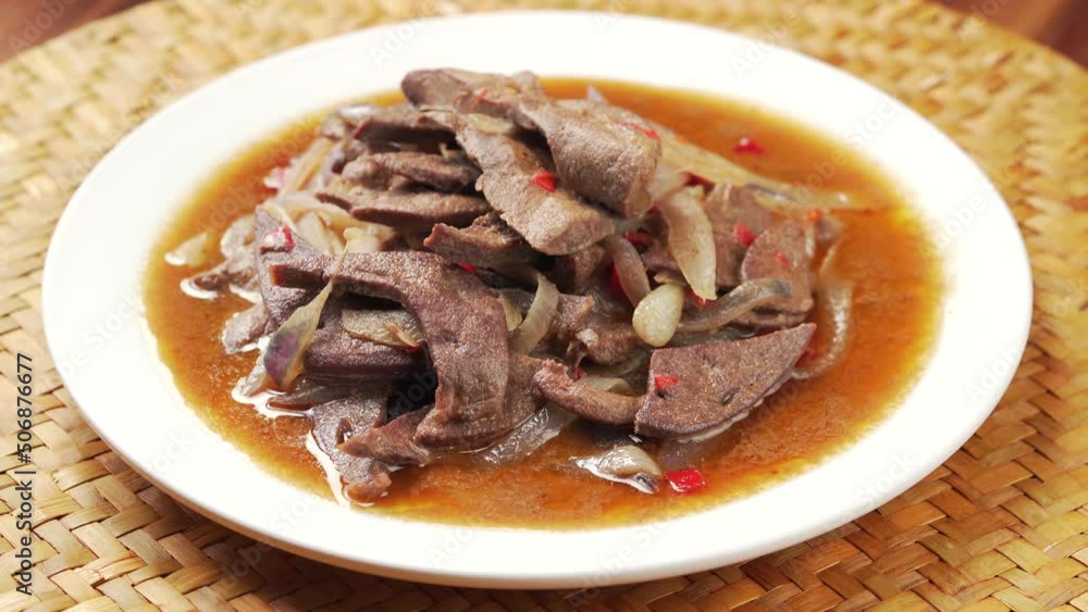 Sichuan-style home cooking - fried pork liver with onions Sichuan-style home cooking - fried pork liver with onions