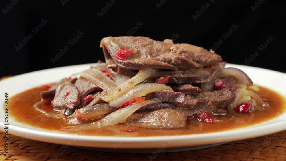 Sichuan-style home cooking - fried pork liver with onions Sichuan-style home cooking - fried pork liver with onions