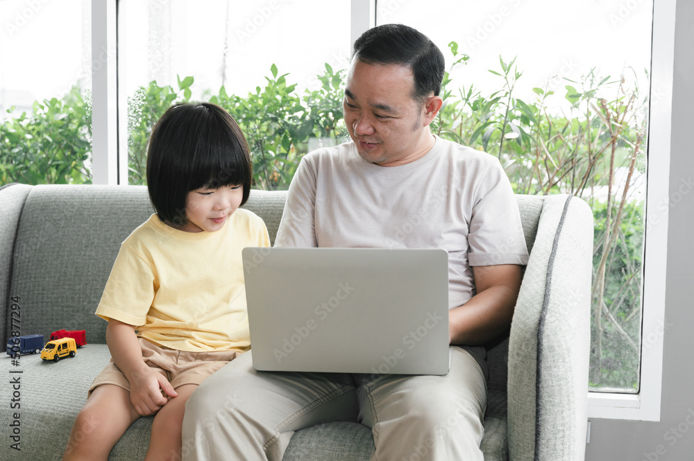 Father work from home with cute son at home Father work from home with cute son at home