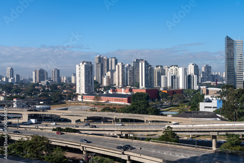 Aerial view of the Marginal Pinheiros Avenue, viaducts car traffic, corporate buildings and skyline of Sao Paulo city in sunny summer day. Brazil. © Imago Photo