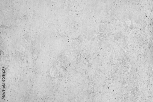 White vintage texture. Rough concrete wall surface with old plaster. Light gray grunge background with space for design.