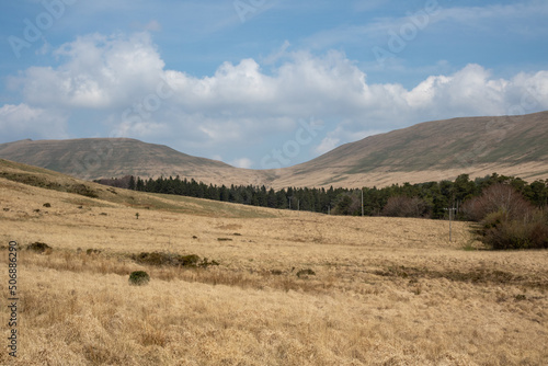 A landscape image taken on a sunny day in the Welsh valley countryside.