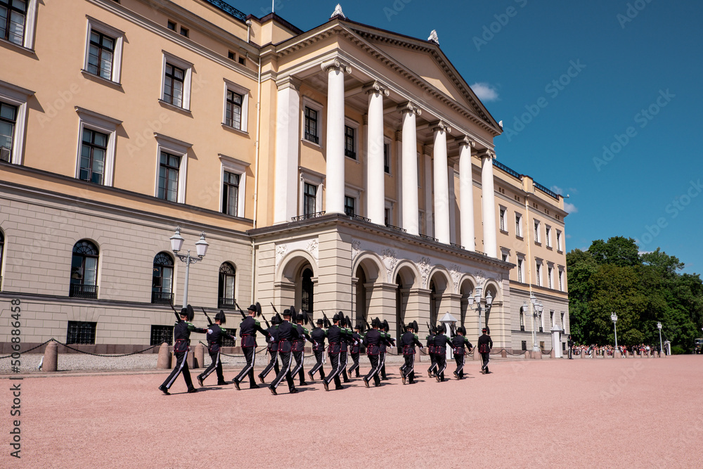 Royal palace in Oslo, Norway with royal guard with riffles and traditional uniform
