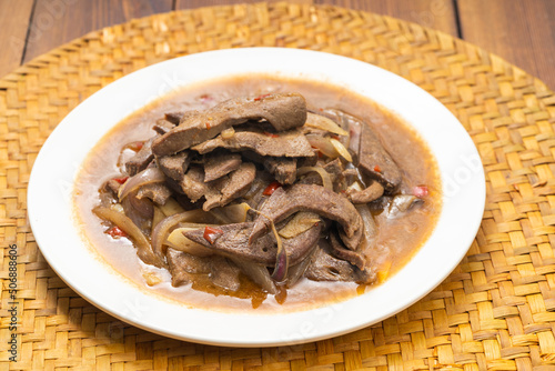 Sichuan-style home cooking - fried pork liver with onions