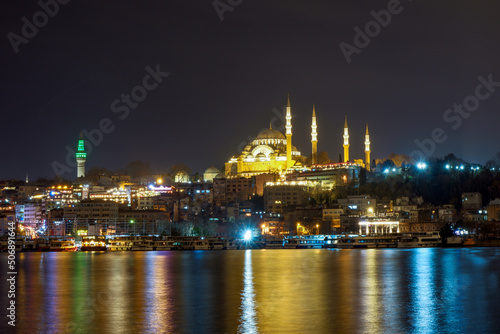 Stunning views of Istanbul cityscape over Bosphorus at night.