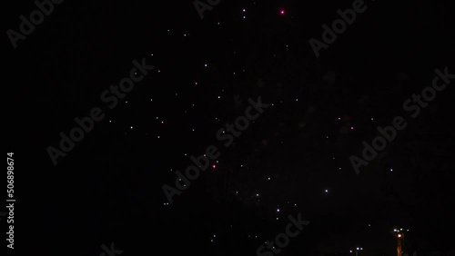 festive fireworks are big in the black sky. 4k format