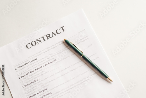 A contract ready to be signed on white desk