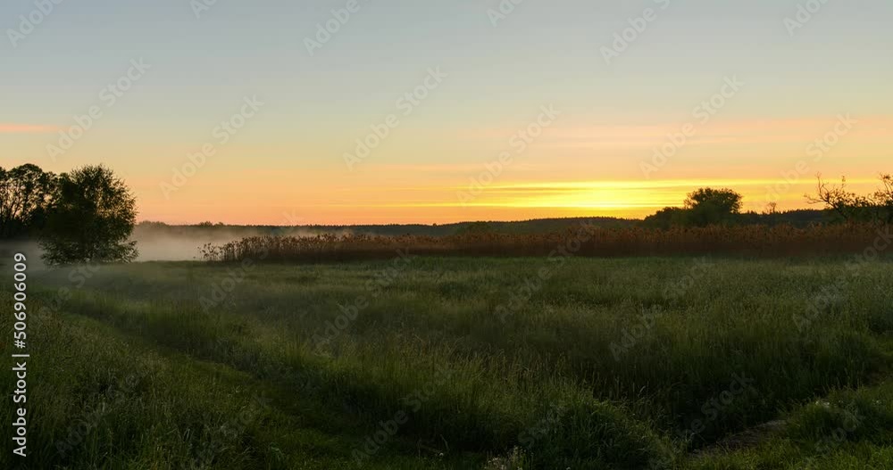Time lapse - Sunrise and mist over a lake, Czechia Time lapse - Sunrise and mist over a lake, Czechia
