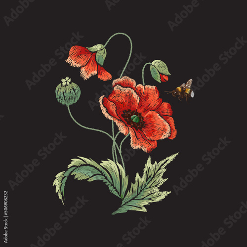 Embroidery floral pattern with poppies flowers and bee .